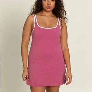 Berry pink athletic mini dress with built in shorts. Comfy and new with tags